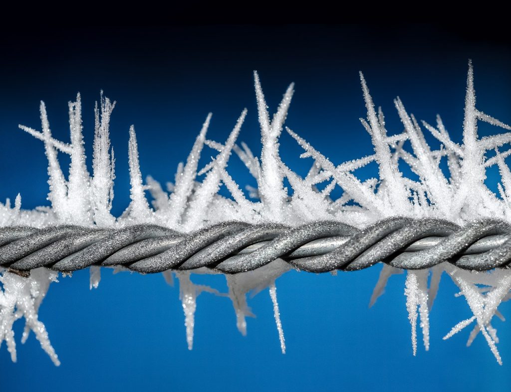 Ice barbed wire boundary